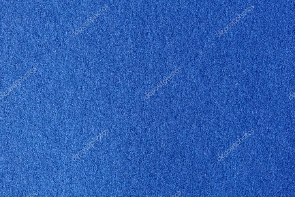 Close up aka macro shot of blue construction paper. Stock Photo by